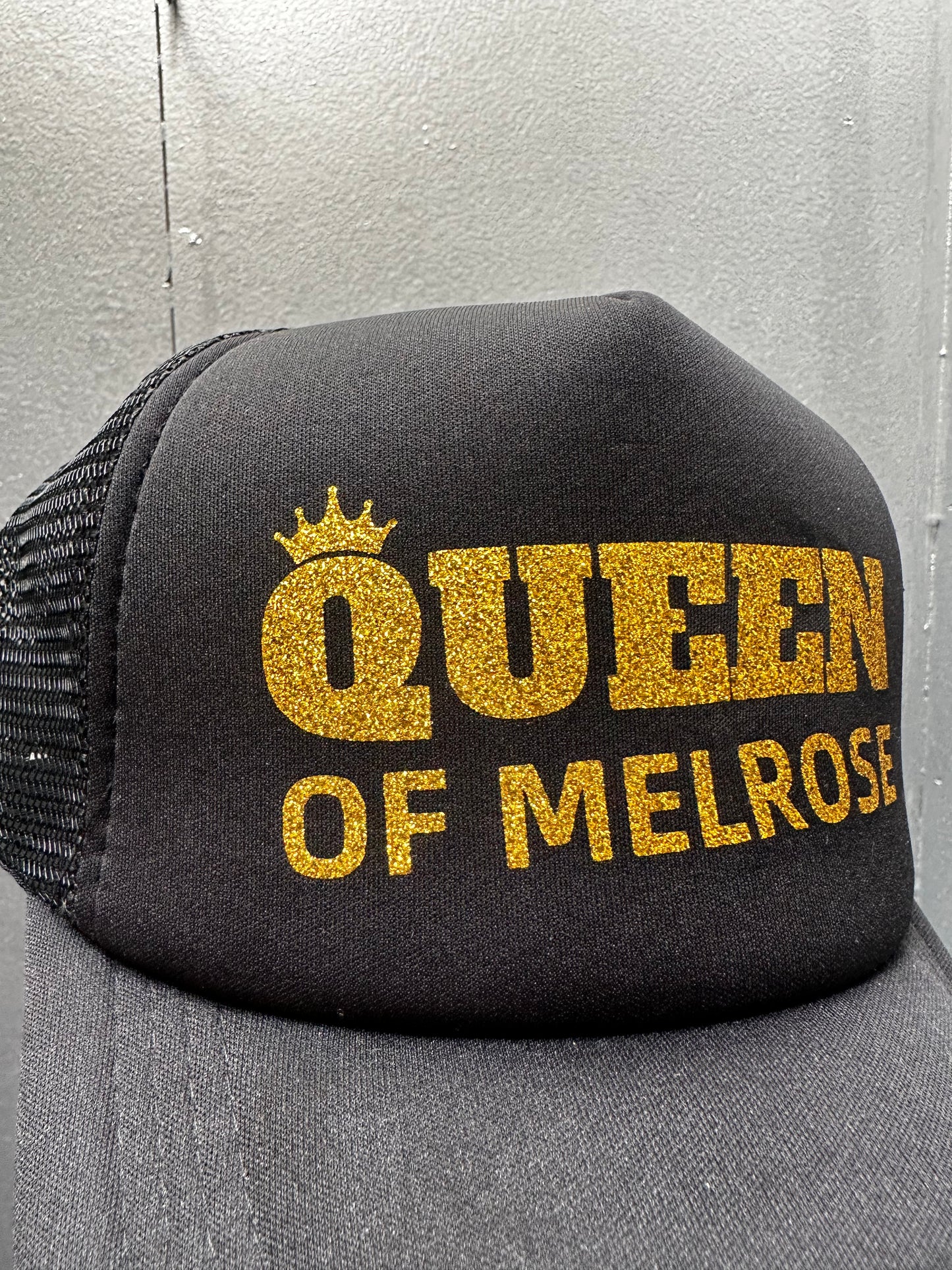 QUEEN OF MELROSE GOLD TRUCKER HAT